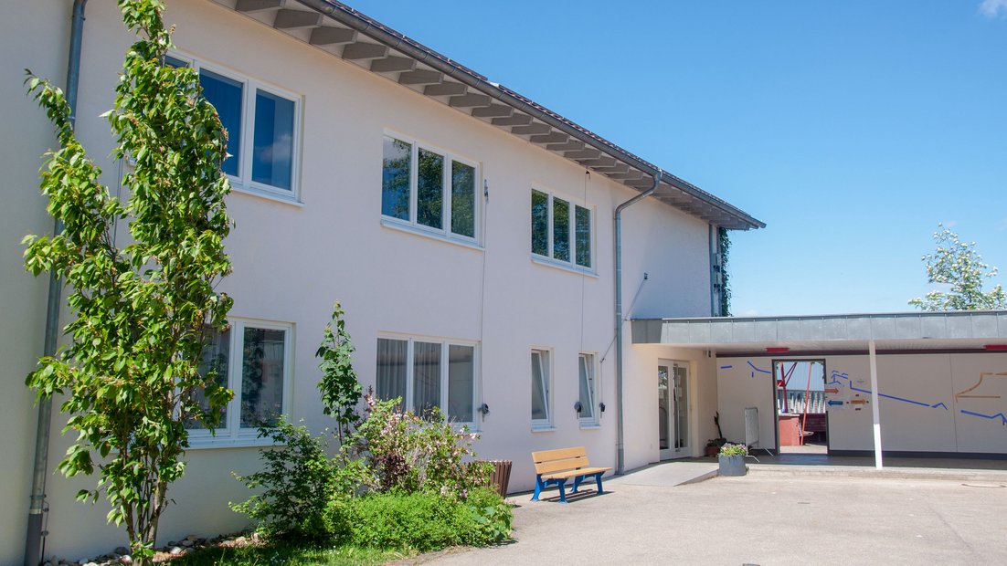 Building from the outside with covered entrance area